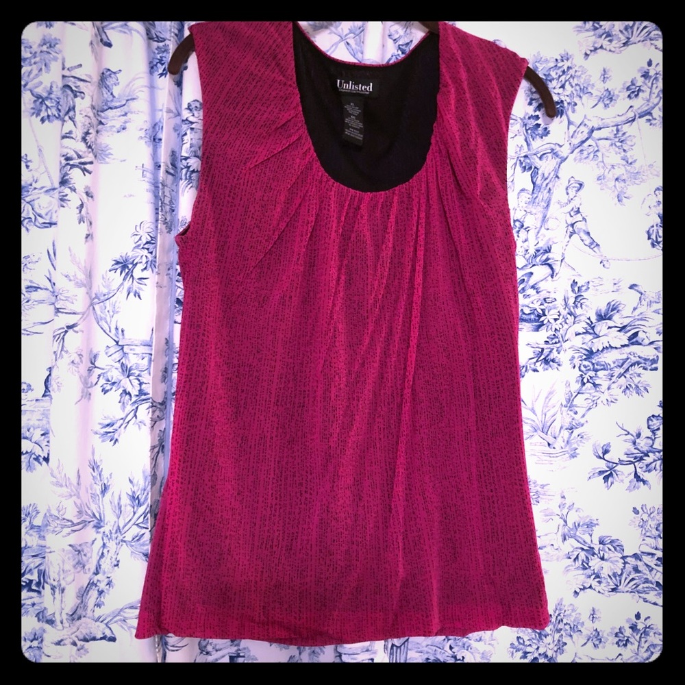 Cute sleeveless top! Worn twice!